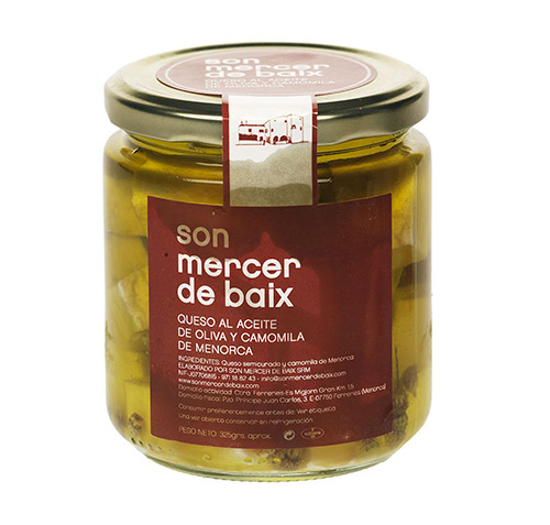 “Morsi” di Formaggio Mahón-Menorca Artigiano al olio di oliva Arbequina con fiori di Camomilla